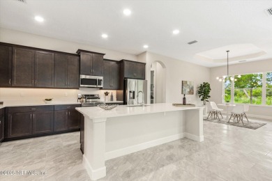 Welcome to refined coastal living in this beautifully crafted on Grand Haven Golf Club in Florida - for sale on GolfHomes.com, golf home, golf lot