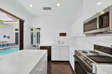 DESIRABLE SINGLE-STORY 3BR/2BA COURTYARD HOME WITH PRIVATE on The Boca Country Club in Florida - for sale on GolfHomes.com, golf home, golf lot