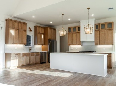 Experience luxury living at its finest in this stunning new home on Bentwood Country Club in Texas - for sale on GolfHomes.com, golf home, golf lot