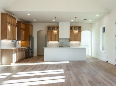 Experience luxury living at its finest in this stunning new home on Bentwood Country Club in Texas - for sale on GolfHomes.com, golf home, golf lot