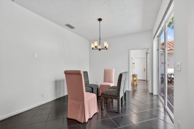 DESIRABLE SINGLE-STORY 3BR/2BA COURTYARD HOME WITH PRIVATE on The Boca Country Club in Florida - for sale on GolfHomes.com, golf home, golf lot