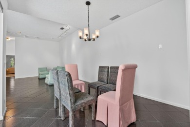 DESIRABLE SINGLE-STORY 3BR/2BA COURTYARD HOME WITH PRIVATE on The Boca Country Club in Florida - for sale on GolfHomes.com, golf home, golf lot