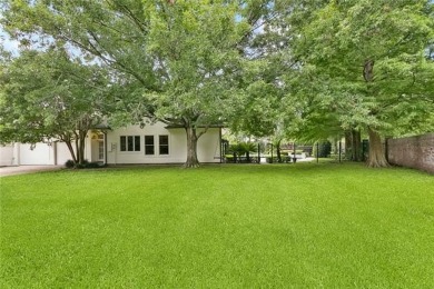 Welcome to 32 English Turn Drive--an elegant 4-bedroom on English Turn Golf and Country Club in Louisiana - for sale on GolfHomes.com, golf home, golf lot
