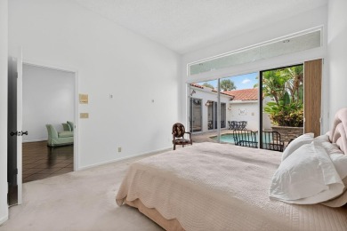 DESIRABLE SINGLE-STORY 3BR/2BA COURTYARD HOME WITH PRIVATE on The Boca Country Club in Florida - for sale on GolfHomes.com, golf home, golf lot
