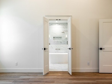 Experience luxury living at its finest in this stunning new home on Bentwood Country Club in Texas - for sale on GolfHomes.com, golf home, golf lot