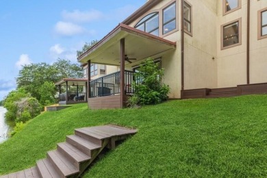 Bienvenue to your own slice of lakeside charm on Lake Henderson! on Rocky Bayou Country Club in Florida - for sale on GolfHomes.com, golf home, golf lot