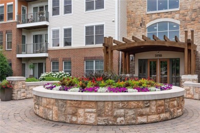 Spacious two-bedroom, two bathroom condo has walls of windows in on The Chaska Par 30 Golf Course in Minnesota - for sale on GolfHomes.com, golf home, golf lot