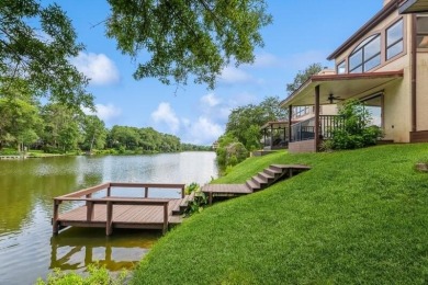 Bienvenue to your own slice of lakeside charm on Lake Henderson! on Rocky Bayou Country Club in Florida - for sale on GolfHomes.com, golf home, golf lot