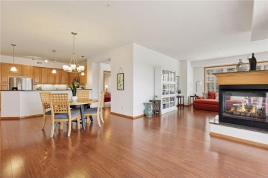 Spacious two-bedroom, two bathroom condo has walls of windows in on The Chaska Par 30 Golf Course in Minnesota - for sale on GolfHomes.com, golf home, golf lot
