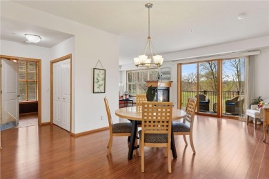 Spacious two-bedroom, two bathroom condo has walls of windows in on The Chaska Par 30 Golf Course in Minnesota - for sale on GolfHomes.com, golf home, golf lot