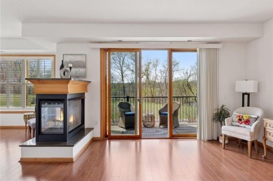 Spacious two-bedroom, two bathroom condo has walls of windows in on The Chaska Par 30 Golf Course in Minnesota - for sale on GolfHomes.com, golf home, golf lot