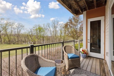 Spacious two-bedroom, two bathroom condo has walls of windows in on The Chaska Par 30 Golf Course in Minnesota - for sale on GolfHomes.com, golf home, golf lot