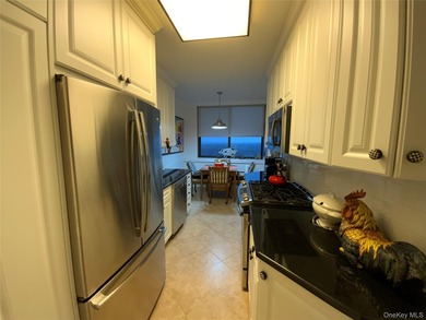 Long, wide and dramatic living room, formal dining room, gourmet on Towers Country Club in New York - for sale on GolfHomes.com, golf home, golf lot