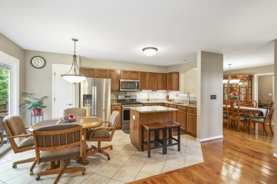 Elegant Two Story end unit Townhome nestled in Hidden Lakes on Seven Bridges Golf Club in Illinois - for sale on GolfHomes.com, golf home, golf lot