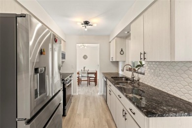 Updated Price, Same Charm! This home welcomes you to the life on Highland Lakes Executive Golf Course in Florida - for sale on GolfHomes.com, golf home, golf lot