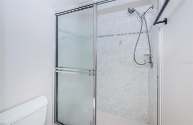 Welcome to low-maintenance Florida living in the guard-gated on Seven Springs Golf and Country Club in Florida - for sale on GolfHomes.com, golf home, golf lot