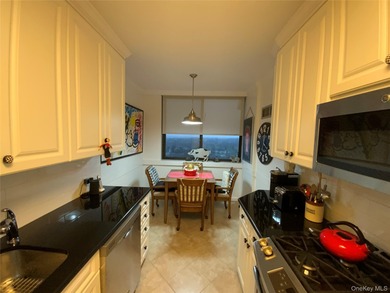 Long, wide and dramatic living room, formal dining room, gourmet on Towers Country Club in New York - for sale on GolfHomes.com, golf home, golf lot