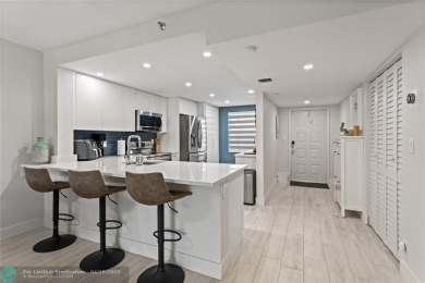 Beautifully renovated, spacious residence with large, screened on Palm-Aire Country Club and Resort - Palms in Florida - for sale on GolfHomes.com, golf home, golf lot