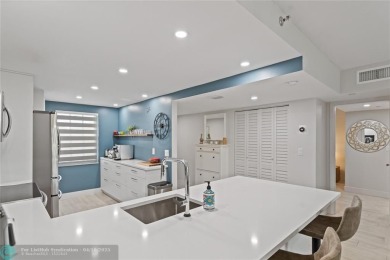 Beautifully renovated, spacious residence with large, screened on Palm-Aire Country Club and Resort - Palms in Florida - for sale on GolfHomes.com, golf home, golf lot