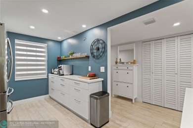 Beautifully renovated, spacious residence with large, screened on Palm-Aire Country Club and Resort - Palms in Florida - for sale on GolfHomes.com, golf home, golf lot
