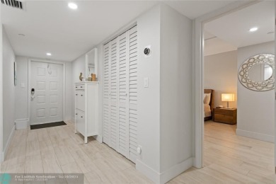 Beautifully renovated, spacious residence with large, screened on Palm-Aire Country Club and Resort - Palms in Florida - for sale on GolfHomes.com, golf home, golf lot