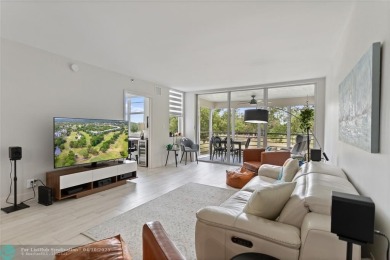 Beautifully renovated, spacious residence with large, screened on Palm-Aire Country Club and Resort - Palms in Florida - for sale on GolfHomes.com, golf home, golf lot