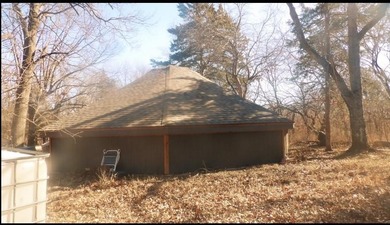 Lovely Octagon cabin at Sugar Valley Lake, home is located on 2 on Sugar Valley Lakes Golf Course in Kansas - for sale on GolfHomes.com, golf home, golf lot