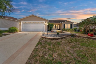 Welcome to this well-maintained AMARILLO MODEL located in the on The Links of Spruce Creek in Florida - for sale on GolfHomes.com, golf home, golf lot