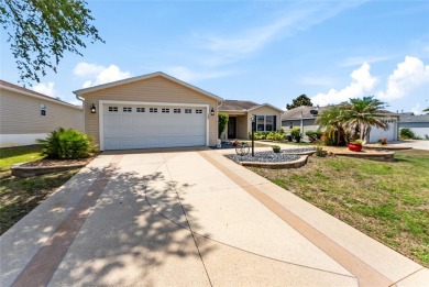 Welcome to this well-maintained AMARILLO MODEL located in the on The Links of Spruce Creek in Florida - for sale on GolfHomes.com, golf home, golf lot