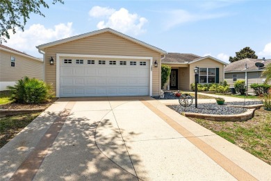 Welcome to this well-maintained AMARILLO MODEL located in the on The Links of Spruce Creek in Florida - for sale on GolfHomes.com, golf home, golf lot
