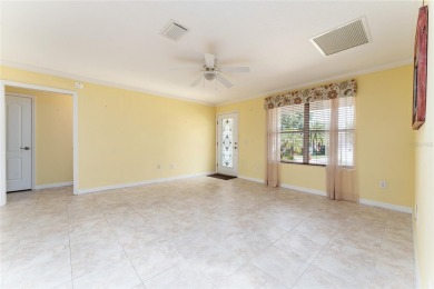 Welcome to this well-maintained AMARILLO MODEL located in the on The Links of Spruce Creek in Florida - for sale on GolfHomes.com, golf home, golf lot