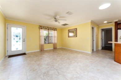 Welcome to this well-maintained AMARILLO MODEL located in the on The Links of Spruce Creek in Florida - for sale on GolfHomes.com, golf home, golf lot