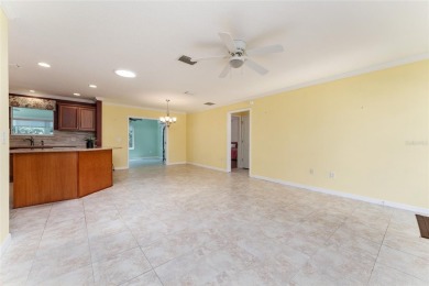 Welcome to this well-maintained AMARILLO MODEL located in the on The Links of Spruce Creek in Florida - for sale on GolfHomes.com, golf home, golf lot