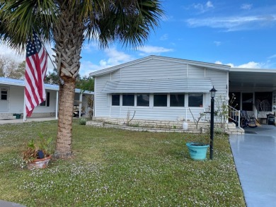Lovely 2/2 in vibrant 55+ lease hold ($844) community. Wall of on Spanish Lakes Fairways in Florida - for sale on GolfHomes.com, golf home, golf lot
