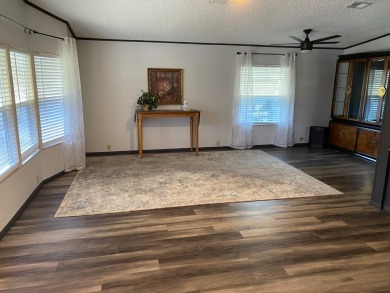 Lovely 2/2 in vibrant 55+ lease hold ($844) community. Wall of on Spanish Lakes Fairways in Florida - for sale on GolfHomes.com, golf home, golf lot