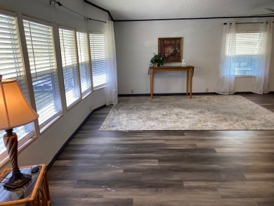 Lovely 2/2 in vibrant 55+ lease hold ($844) community. Wall of on Spanish Lakes Fairways in Florida - for sale on GolfHomes.com, golf home, golf lot