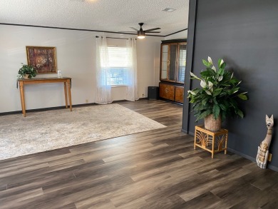 Lovely 2/2 in vibrant 55+ lease hold ($844) community. Wall of on Spanish Lakes Fairways in Florida - for sale on GolfHomes.com, golf home, golf lot