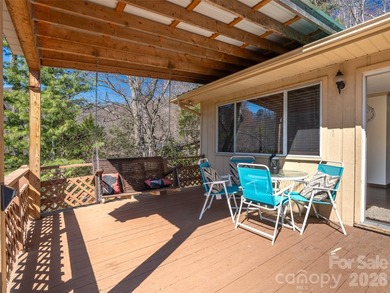 Positioned above Maggie Valley Club & Resort, this 2 bedroom, 2 on Maggie Valley Resort and Country Club in North Carolina - for sale on GolfHomes.com, golf home, golf lot