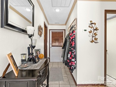 Positioned above Maggie Valley Club & Resort, this 2 bedroom, 2 on Maggie Valley Resort and Country Club in North Carolina - for sale on GolfHomes.com, golf home, golf lot