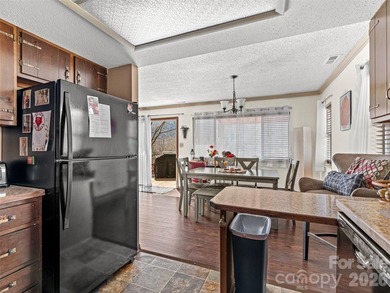 Positioned above Maggie Valley Club & Resort, this 2 bedroom, 2 on Maggie Valley Resort and Country Club in North Carolina - for sale on GolfHomes.com, golf home, golf lot