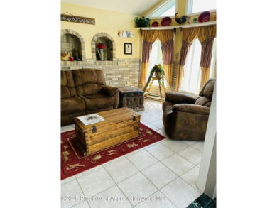 Coined ''America's Most Trusted Horseman'', John Lyons and his on Battlement Mesa Golf Course in Colorado - for sale on GolfHomes.com, golf home, golf lot