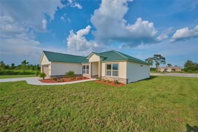 NEW CONSTRUCTION!  This 3 bedroom 2 bath beauty has all the on Indian Lake Estates Golf and Country Club in Florida - for sale on GolfHomes.com, golf home, golf lot