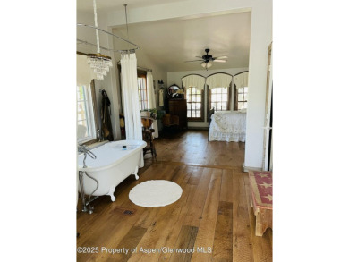 Coined ''America's Most Trusted Horseman'', John Lyons and his on Battlement Mesa Golf Course in Colorado - for sale on GolfHomes.com, golf home, golf lot
