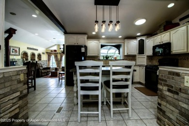 Coined ''America's Most Trusted Horseman'', John Lyons and his on Battlement Mesa Golf Course in Colorado - for sale on GolfHomes.com, golf home, golf lot