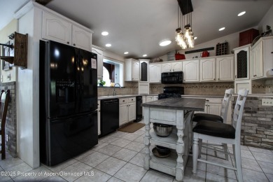 Coined ''America's Most Trusted Horseman'', John Lyons and his on Battlement Mesa Golf Course in Colorado - for sale on GolfHomes.com, golf home, golf lot