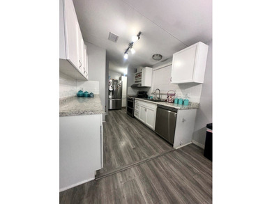 Comfort and ease awaits on 4.92 cleared fenced acres with gated on Chiefland Golf and Country Club in Florida - for sale on GolfHomes.com, golf home, golf lot