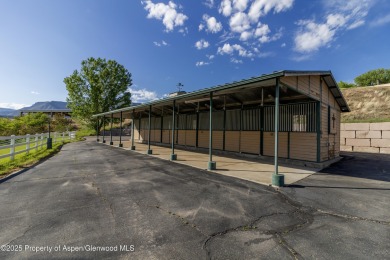 Coined ''America's Most Trusted Horseman'', John Lyons and his on Battlement Mesa Golf Course in Colorado - for sale on GolfHomes.com, golf home, golf lot