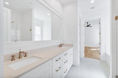 This thoughtfully designed expanded Coral Bean plan by Huff on Origins Golf Club in Florida - for sale on GolfHomes.com, golf home, golf lot