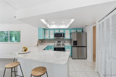 Welcome to this beautifully updated 2-bedroom, 2-bath home on Plantation Inn and Golf Resort  in Florida - for sale on GolfHomes.com, golf home, golf lot