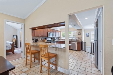 Welcome to this beautifully maintained 3-bedroom, 2-bath home on The Grand Club - Pine Lakes Course in Florida - for sale on GolfHomes.com, golf home, golf lot